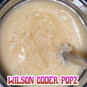 Creamy porridge in a bowl with spoon.